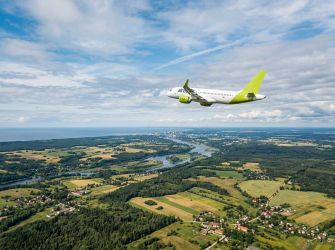 Airplane flying in the sky over Latvia